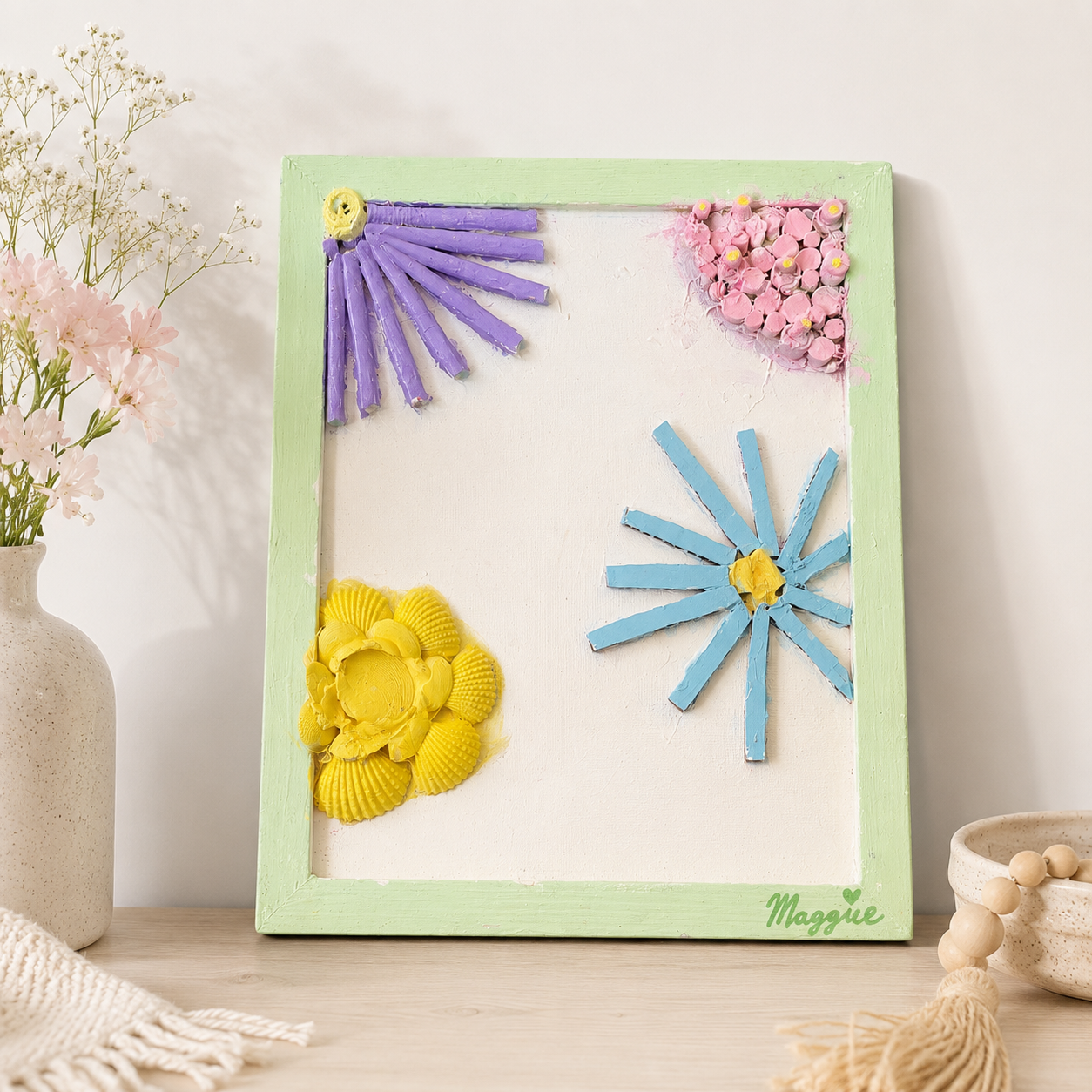 Pastel dimensional flowers in a mint green frame